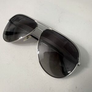Tom Ford polarized sunglasses, black tinted lenses and silver rims.